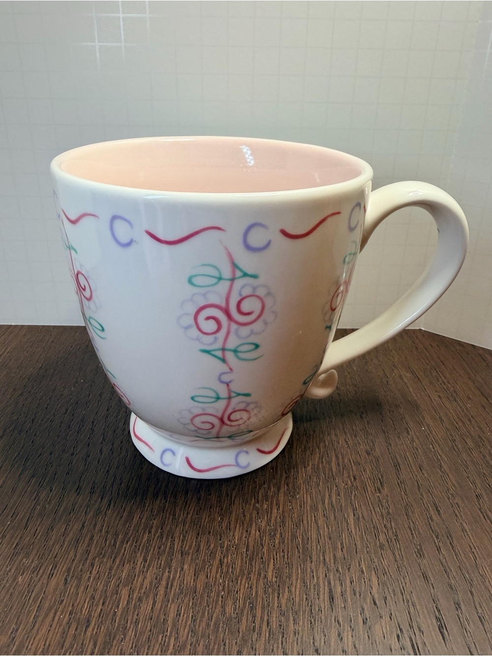 Starbucks White Ceramic Mug with Pink Interior and Multicolor Floral Motif